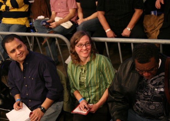 Kerstin Broockmann, who serves as Assistant News Editor for the CBZ Newswire, smiles for the camera at ringside next to outspoken boxing journalist Coyote Duran (left)