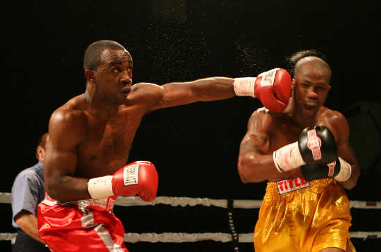 Latimore (L) lands a punch on Ford--Photo Courtesy of Rumble Time Promotions, Bob Barton