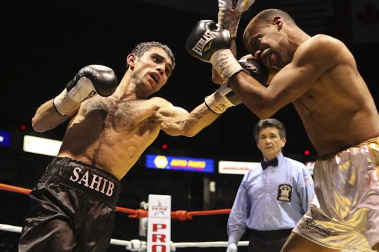 Sahib Usarov (at left) on the attack.  Photo by Ed Diller/Star Boxing