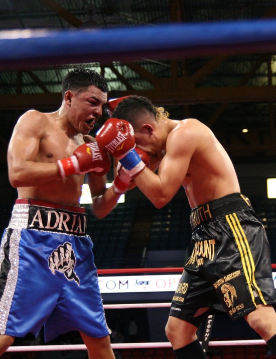 Granados at left, seen here nailing Jaime Herrera with a left to the chin (photo by Belle Ayllon).