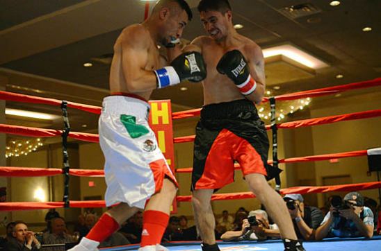 Sergio Montes de Oca at left vs. Salvador Perez last June (photo by Scott Dray)