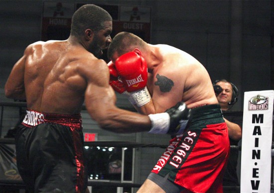 Bryant, seen here walloping Sergei Liakhovich (photo courtesy of www.peltzboxing.com)
