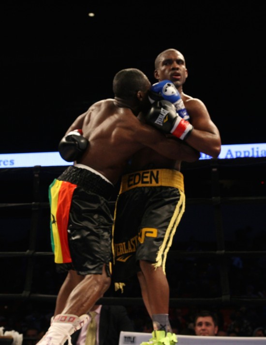 Williams, at right, holds onto a surging Gbenga.