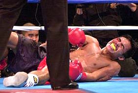 Pacquiao down from low blow