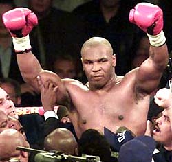 Tyson beats up another bum
